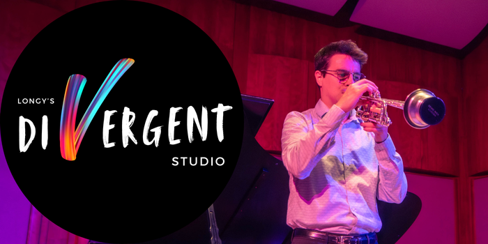 Man is blowing a muted trumpet on stage next to the Divergent Studio logo.